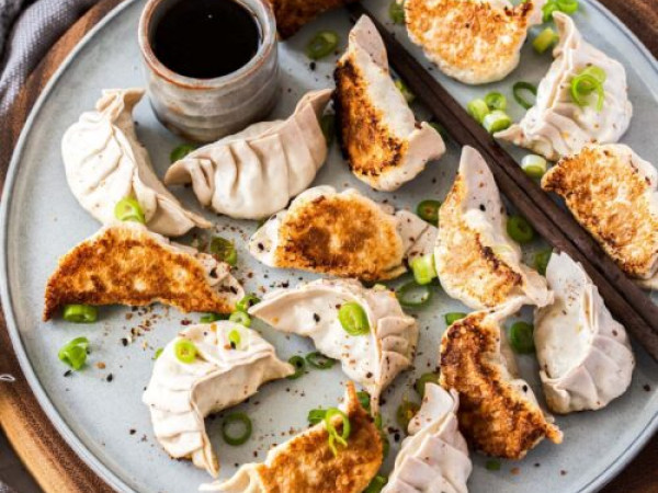 Gyoza Stuffed with Pork and Served with Dipping Sauce