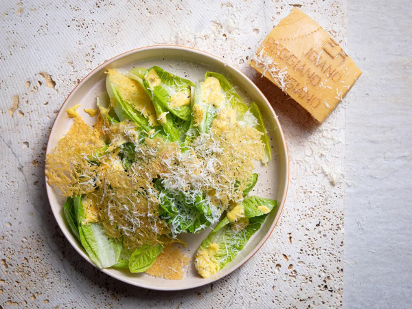 Salad Garnished with Parmesan Crisps