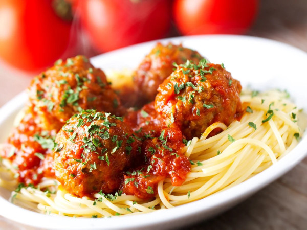 Bison Meatballs Served Over Spaghetti