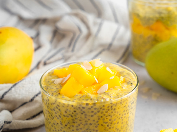 Creamy Oat Pudding Topped with Mango and Coconut