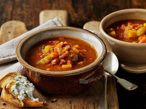 Lentil Soup Topped with Goat Cheese and Arugula